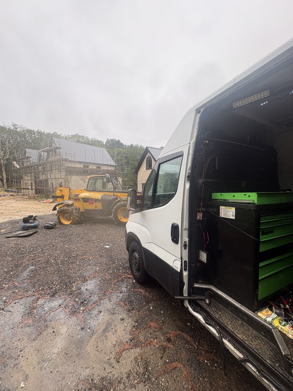 SC Plant and Commercial van with tool drawers open beside a telehandler on a building site